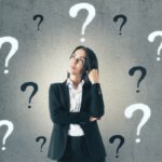 Woman and imagined Question Marks